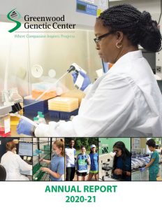 Cover of annual report showing technologist working in a lab